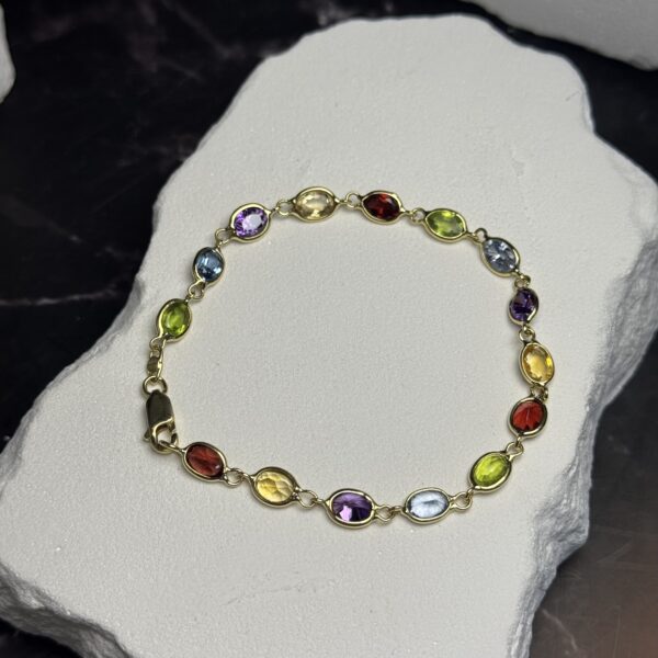 Bracciale oro e pietre